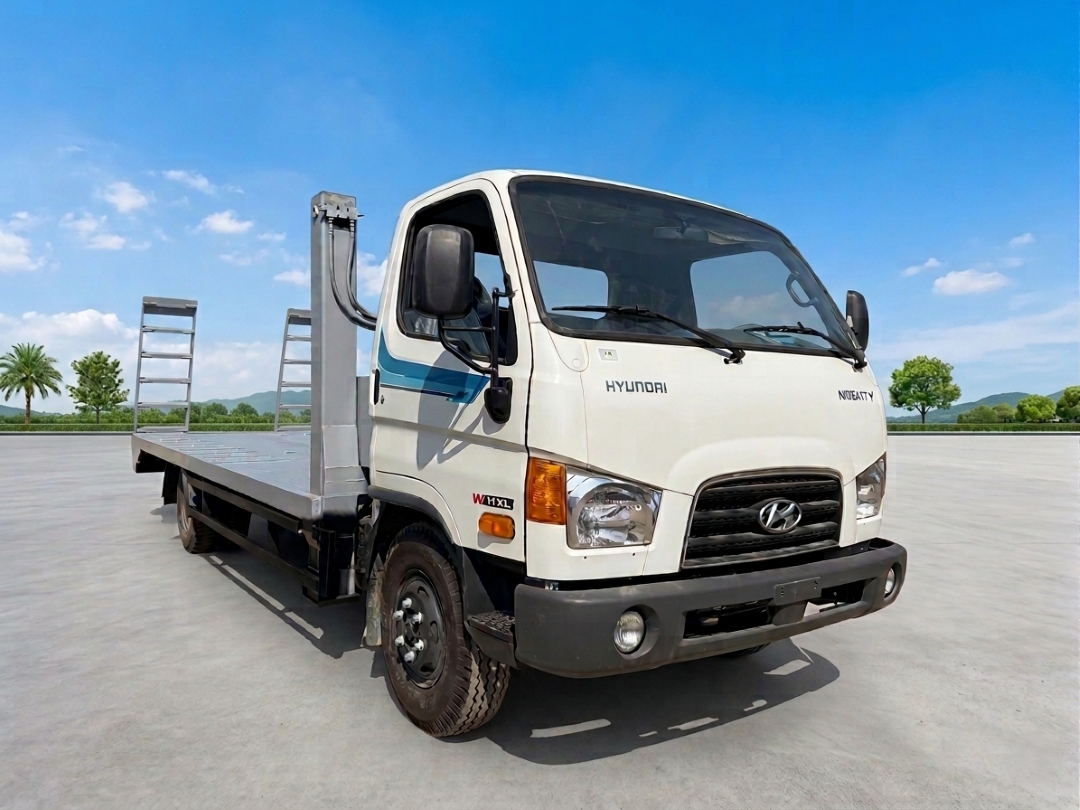 Xe ô tô nâng đầu chở máy Hyundai W11XL chở 6 tấn sàn dài 5m8
