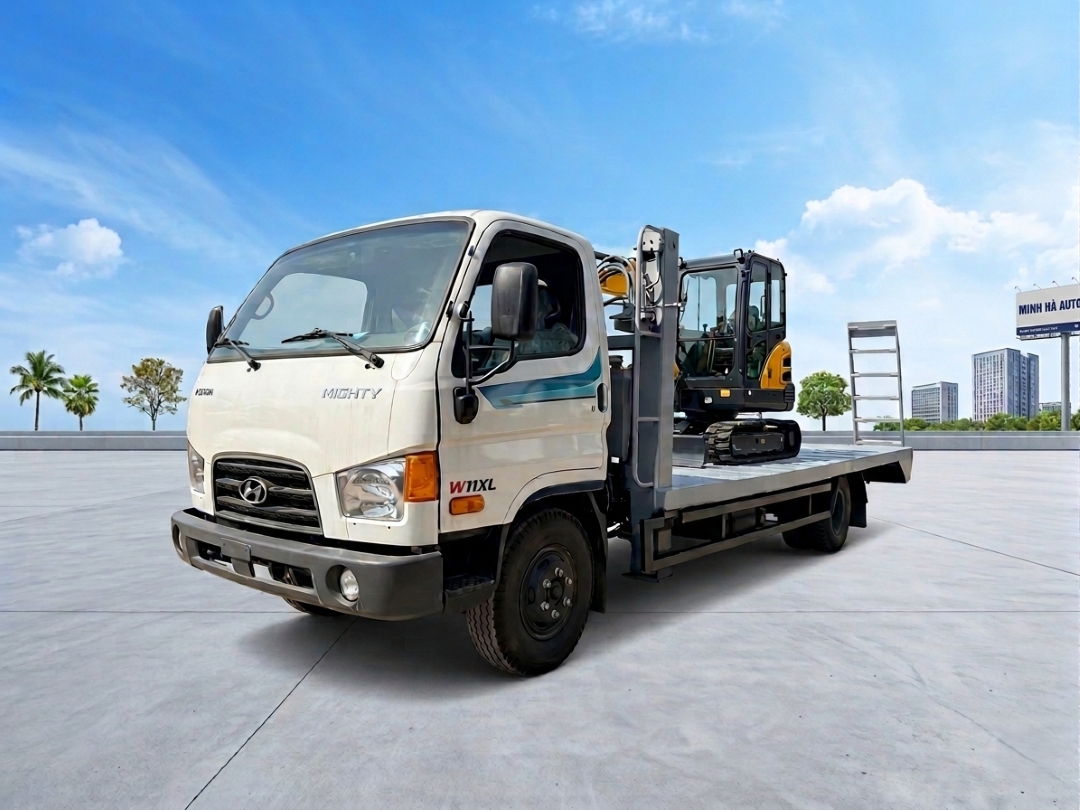 Xe ô tô nâng đầu chở máy Hyundai W11XL chở 6 tấn sàn dài 5m8